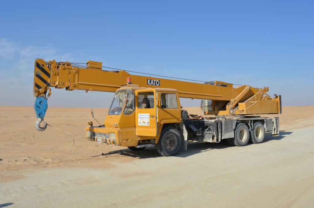 mobile crane with an extended boom, listed on CraneKart, designed for efficient lifting in construction and industrial projects.