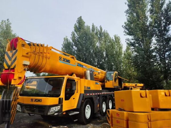 XCMG XCA160L6 160-ton all-terrain crane with 61m main boom and 30m jib in mint condition.