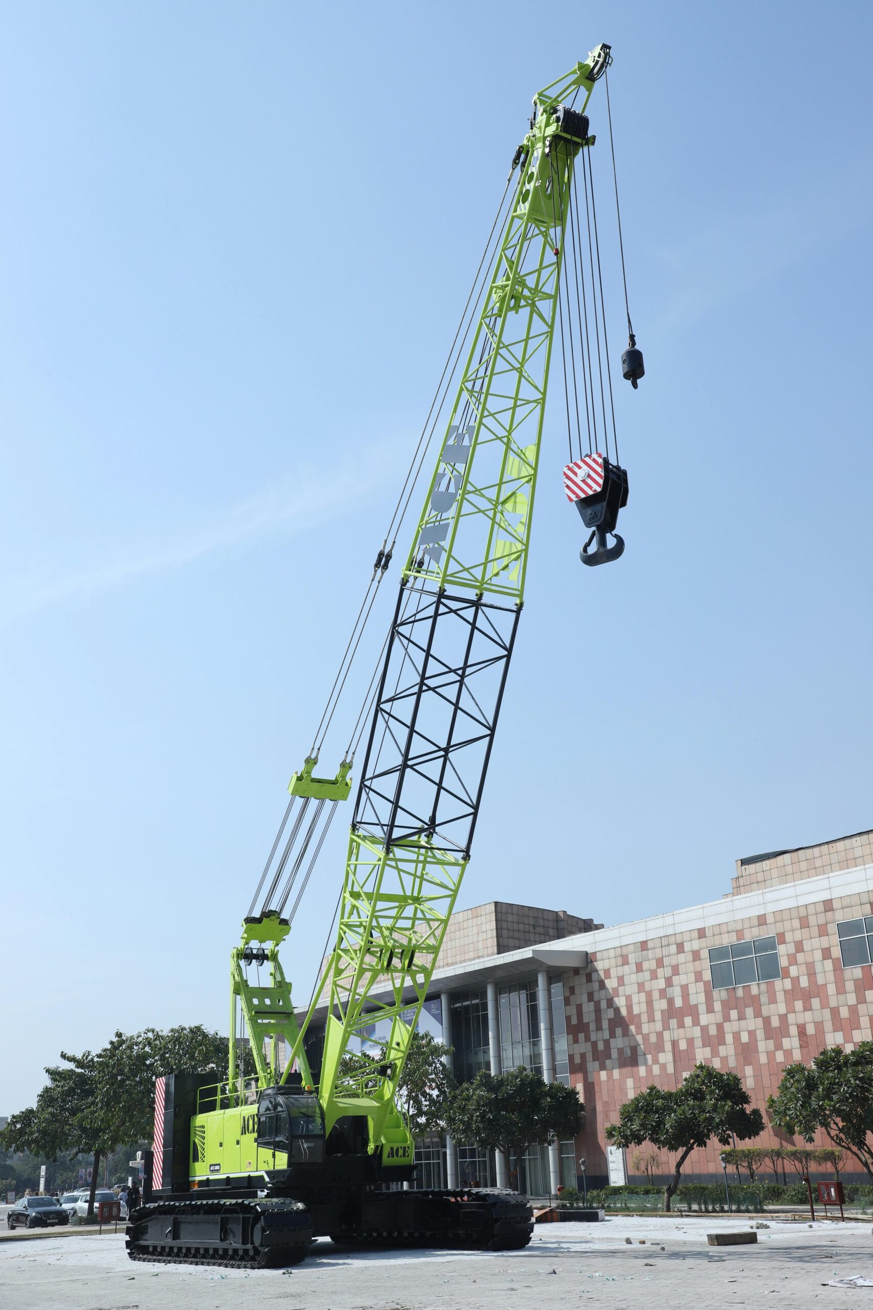 A state-of-the-art automated crane lifting heavy loads at a construction site, showcasing AI-driven precision and safety enhancements.